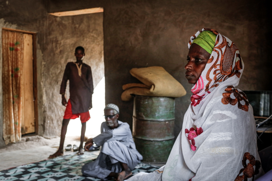 Adama Diamanka’s mother sits in the family’s living room